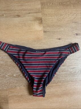 New with tags RVCA navy and red striped bikini bottom. Size 12 or large.